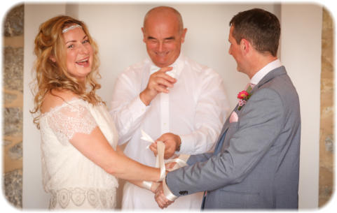 Pic Couple loving their handfasting ritual